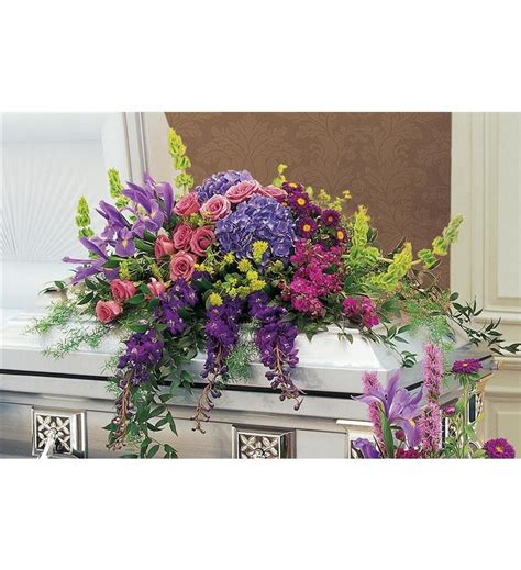 If you would like to purchase funeral sprays, reach out to the family for their recommendations. Graceful Tribute Casket Spray - TF201-1 ($195.26)