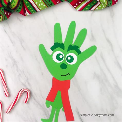 Make This Young Grinch Handprint Craft For Christmas Handprint Craft