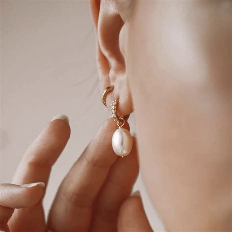 Lily Roos Stunning Gold Huggie Pearl Drop Hoop Earrings Are The