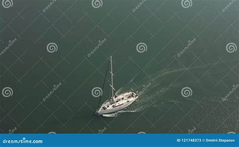 Aerial View Yacht Sailing In Opened Sea Drone View To Sea Boat