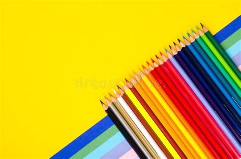 Set Of Colored Pencils For Schoolboy On Bright Background Stock Image