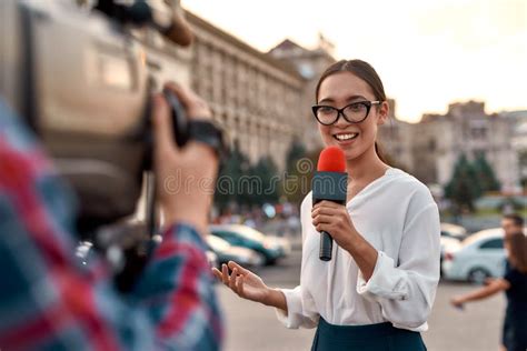 Coverage You Can Count On Tv Reporter Presenting The News Outdoors
