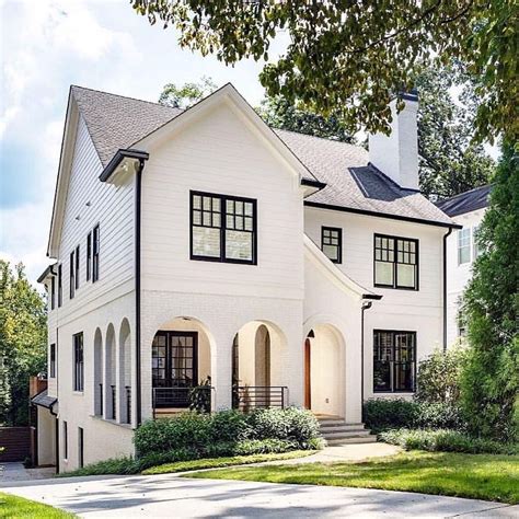 The Classic Black And White Combo Makes The Exterior Of This Home