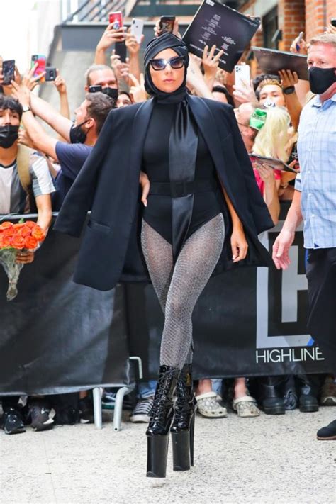 lady gaga turns heads in 9 inch heels dramatic bodysuit and glittering tights