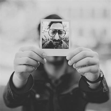 650 Man Holding Polaroid Stock Photos Pictures And Royalty Free Images