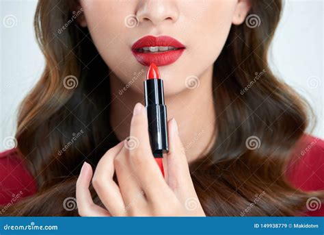 Detail Of A Beautiful Woman Applying Lipstick Stock Image Image Of Beautiful Female 149938779