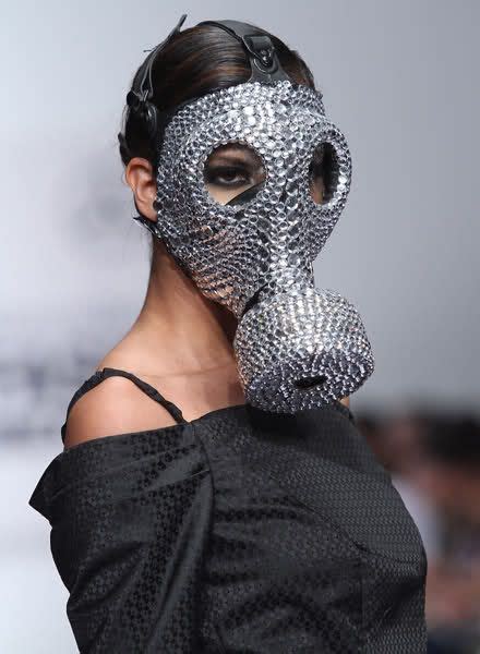 Gas mask man standing with fire flame and smoke on his back. Sign up | Fashion face mask, Gas mask girl, Gas mask