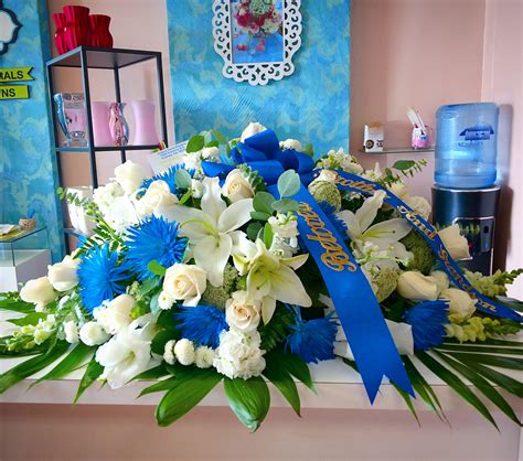 Blue And White Casket Spray In Downey Ca Chitas Floral Designs