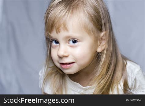 21 Beautiful Little Girl Making Funny Face Free Stock Photos