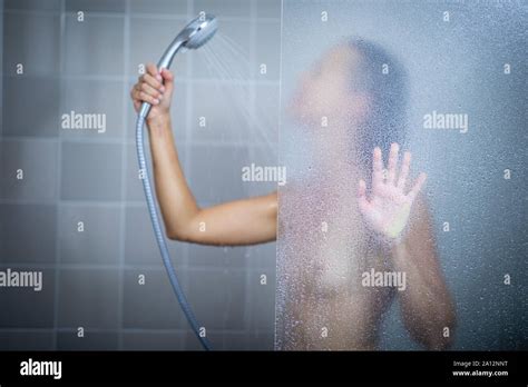Woman Taking A Long Hot Shower Washing Her Hair In A Modern Design