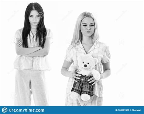 Sisters In Pajamas Looks Unfriendly Jealous Girls In Pink Pajamas Isolated White Background