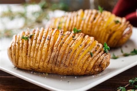 Looking for a tasty potato recipe to serve as the perfect side dish for your next meal? Delicious Herbed Hasselback Potatoes Recipe by Archana's ...
