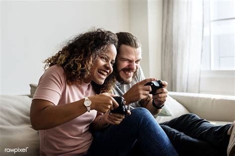 Download Premium Image Of Couple Playing Game At Home Together 384659