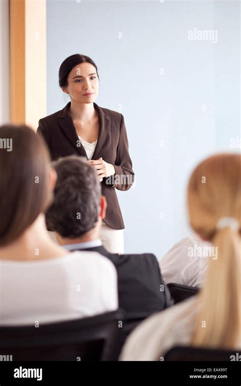 Businesswoman Giving Presentation Stock Photo Alamy