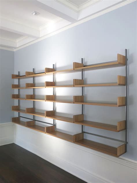 as4 modular shelving system in white oak and cold-rolled steel, wall