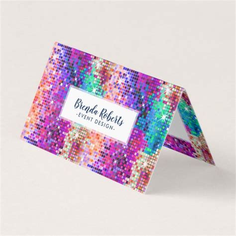 The main background is gradient progressing from a medium toned purple into a deep purple with turquoise, pink, and purples paint splatter spots splashed on the whole card. Colorful Sparkling Disco Glitter Business Card | Zazzle.com