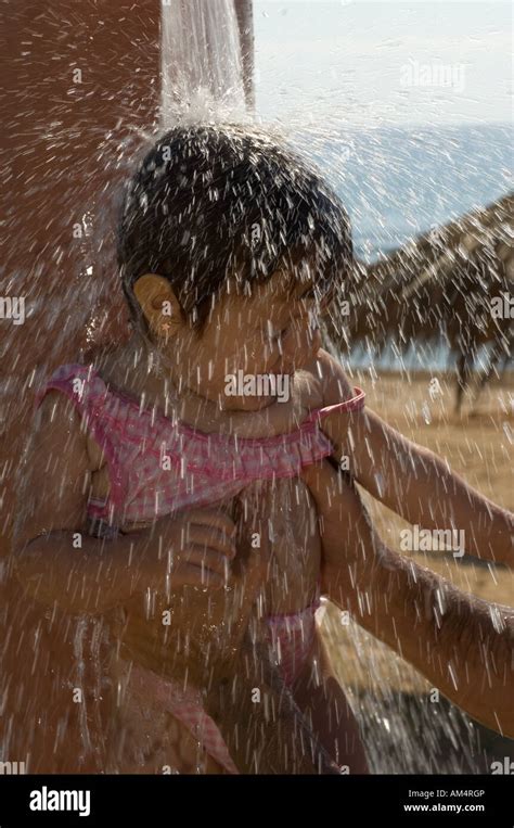 Baby Girl Showering By The Beach Stock Photo Alamy