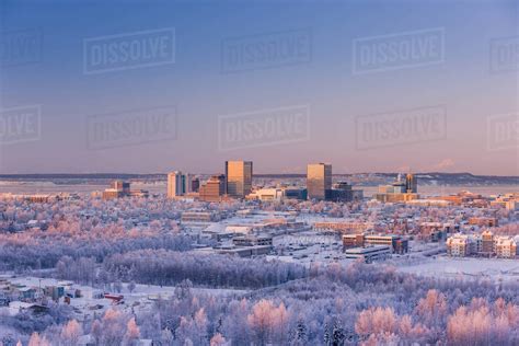 Aerial View Of Downtown Anchorage At Sunset Hoarfrost On The Trees