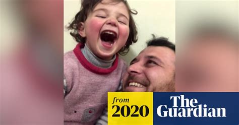 Syrian Father Teaches Daughter To Cope With Shelling Noise Through