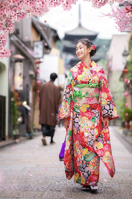 Japanese Girl Walk In Kyoto Old Market And Wooded Yasaka Pagoda Greeting Card By Anek Suwannaphoom
