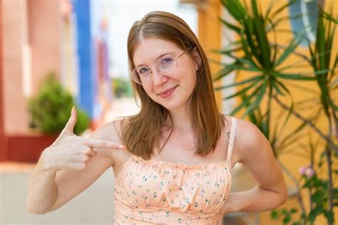 Premium Photo Young French Girl With Glasses At Outdoors Proud And