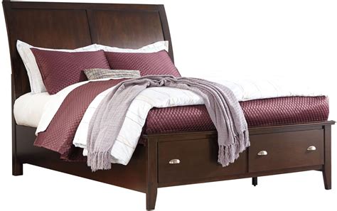 Evanburg Brown Queen Sleigh Storage Bed From Ashley Coleman Furniture
