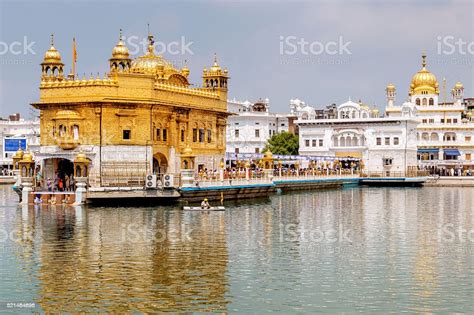 Golden Temple Reflecting In Water Amritsarindia Stock Photo Download