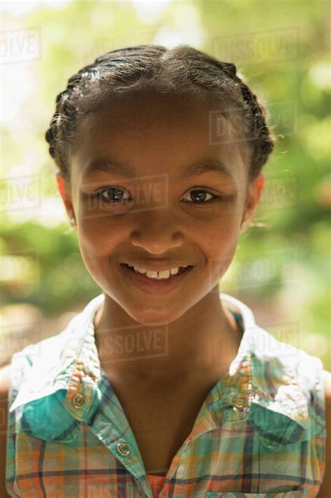 Portrait Of Smiling African American Girl Stock Photo Dissolve