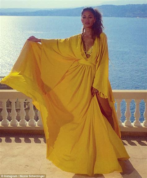 Nicole Scherzinger Shows Off Some Leg In Floaty Yellow Dress In France