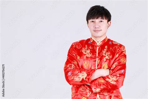 Handsome Chinese Man On Smart Red Traditional Mandarin Clothing