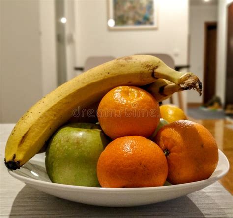 Healthy Fruit Apple Banana And Oranges In A Bowl On A Table Stock Image