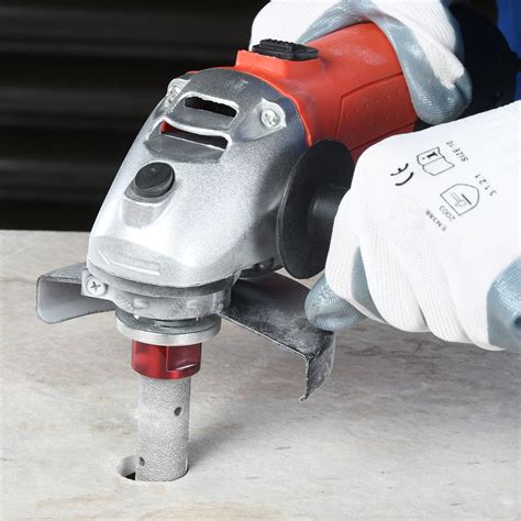 The following ways will be able to help you cut holes into this particular type of tile 20MM M14 BRAZED DIAMOND MILL
