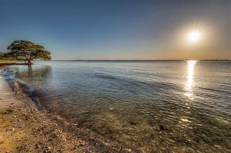 Bay Side Sunset Photograph By Ronald Kotinsky Pixels