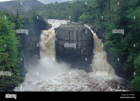The River Tees Falls Over High Force Waterfall In Teesdale County