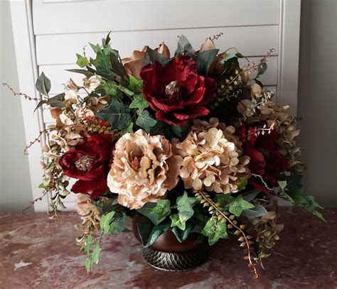 Search for burgundy flower in these categories. Magnolia and Hydrangea Arrangement | Hydrangea ...