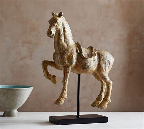 Simple curves and distinct details create a minimal piece, great for any living room or home office. Horse On Stand | Pottery Barn AU