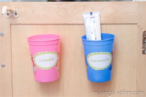 Organizing Toothbrushes And Toothpaste Out Of Sight Cups For Toothpaste