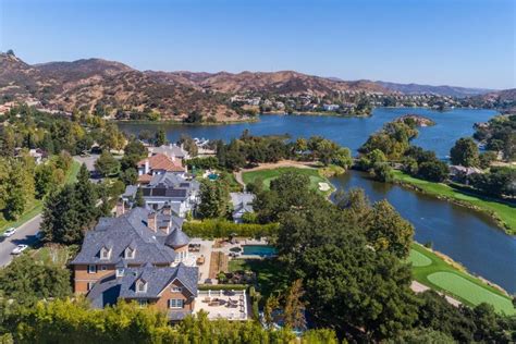 Lavish Hamptons Style Estate In Gated Sherwood Country Club