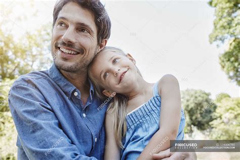 Happy Father And Daughter Hugging Outdoors — Childhood Smiling Stock