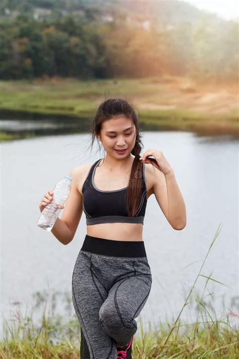 Attractive Healthy Fitness Girl With Fresh Water After Workout Stock