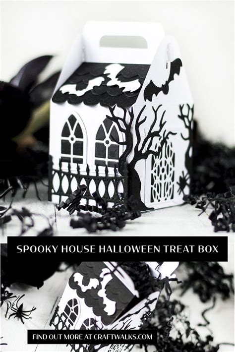 A Halloween Treat Box With Spooky House Design