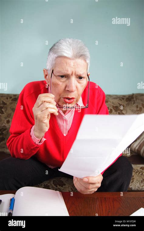 Shocking Amount Of Bills An Old Lady Has To Pay For Stock Photo Alamy