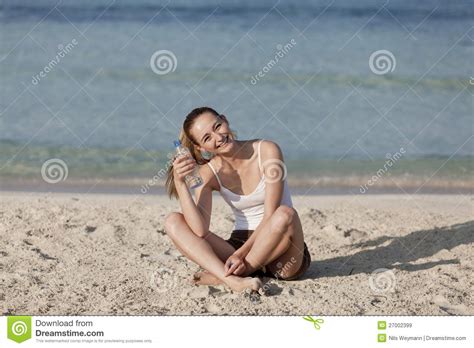 Woman Drinking Water From A Bottle On The Beach Portrait Stock Image Image Of Drink Fitness