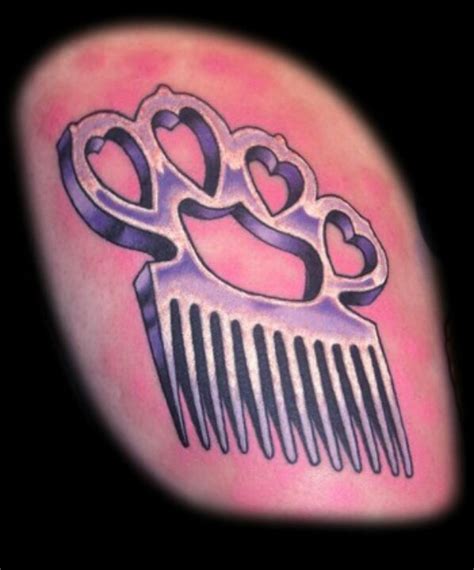 Colored Comb Tattoo On Right Arm
