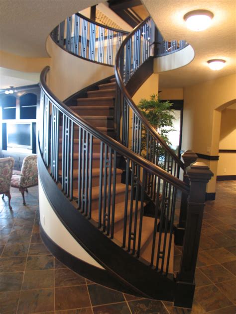 If you can cut a straight line you can install this safe railing on your stairs. Wrought Iron Railings: An Elegant Design Option | Artistic Stairs Canada