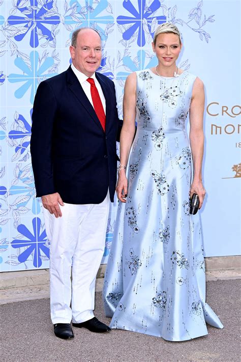Princess Charlene And Prince Albert Leaned Sweetly On Each Other At Monacos Red Cross Ball