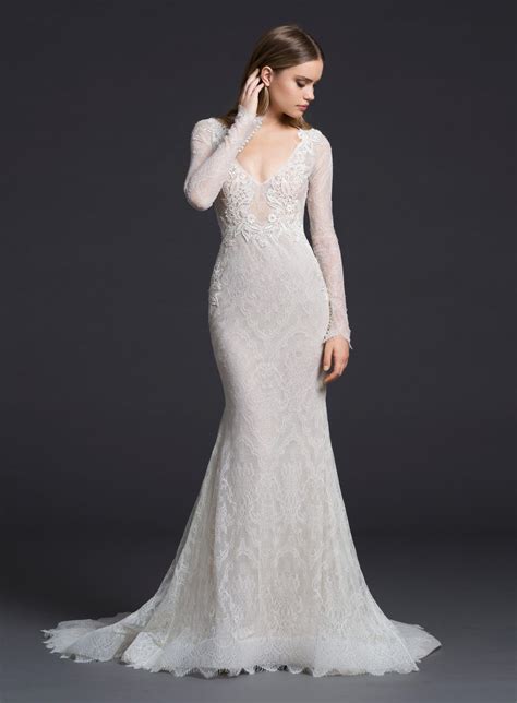 Goddess gowns in luxurious fabrics shimmer and bedazzle, as modern florals with botanical motifs. Lazaro Bridal | Fit and flare wedding dress, Wedding ...