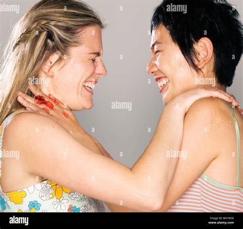 Two Women Play Fighting With Jelly Stock Photo Alamy