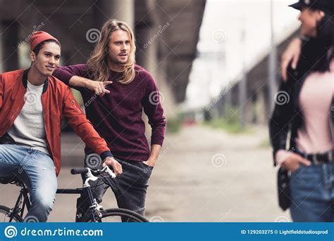 Men Flirting With Woman Passing By Stock Image Image Of Ride Retro 129203275