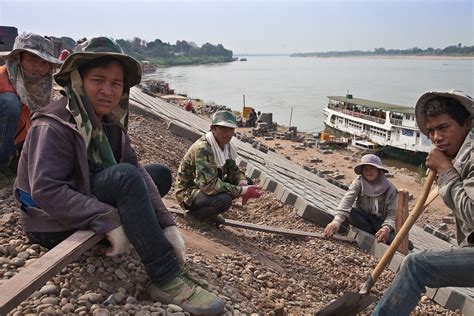 Vientiane Laos Workers On The Mekong Riverfront Improveme John